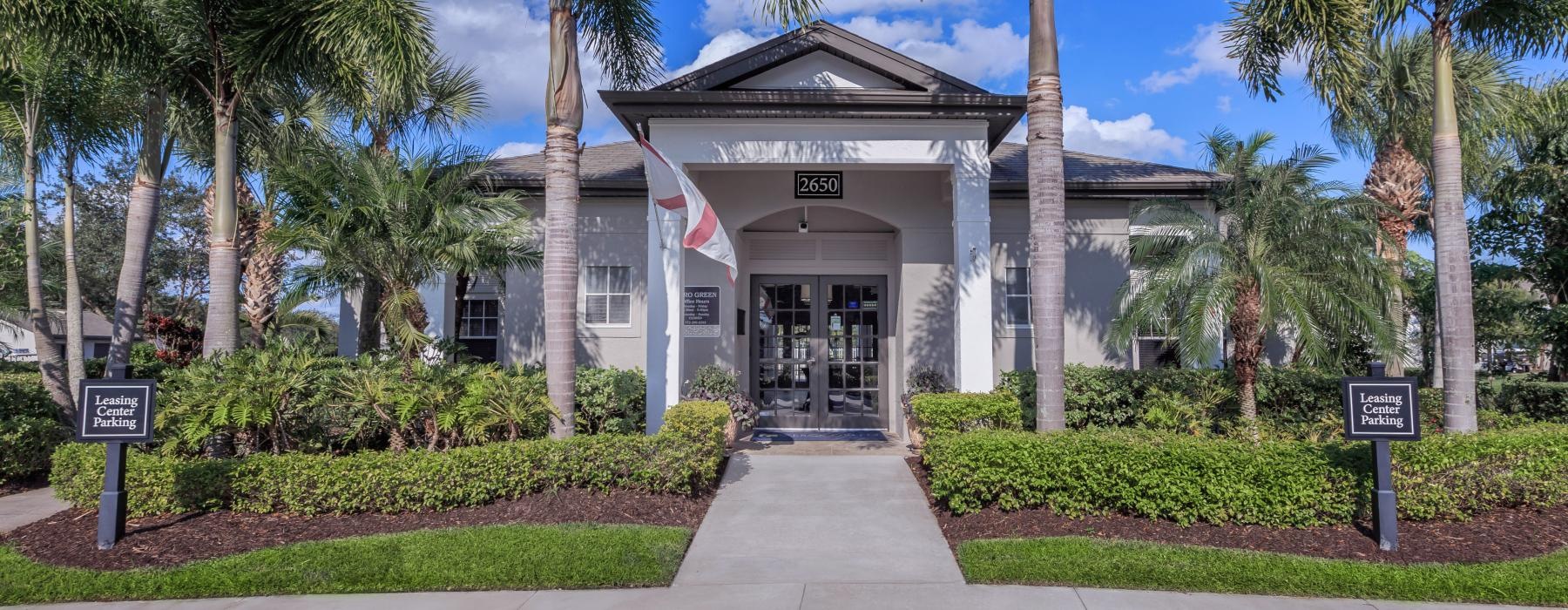 a building with palm trees