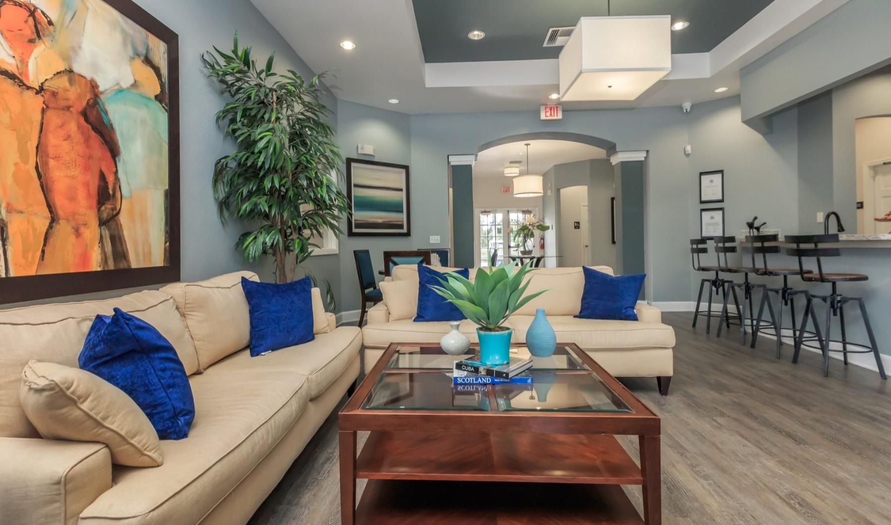 Access to resident-only features a living room with a couch and coffee table